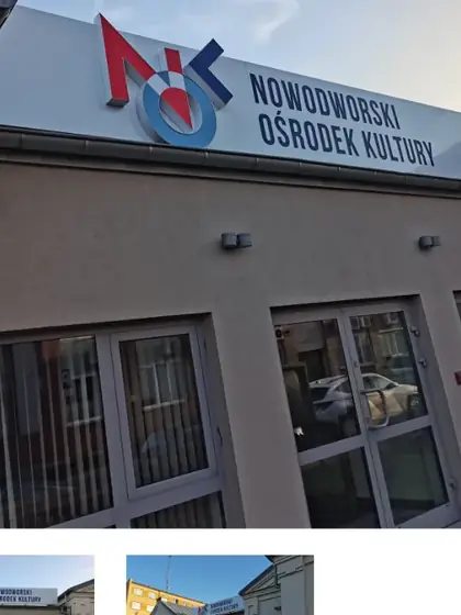 Szyld nad wejściem do lokalu usługowego